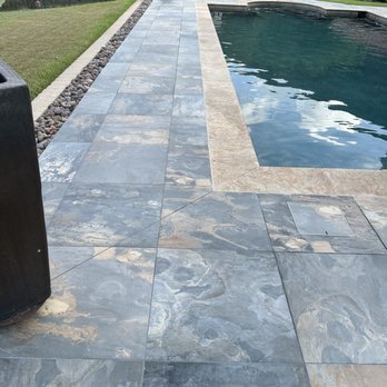 Zafire Pools - New porcelain tiles now in place having been positioned with skill and attention to detail for a natural stone appearance. - Pool & Hot Tub Service Near Me