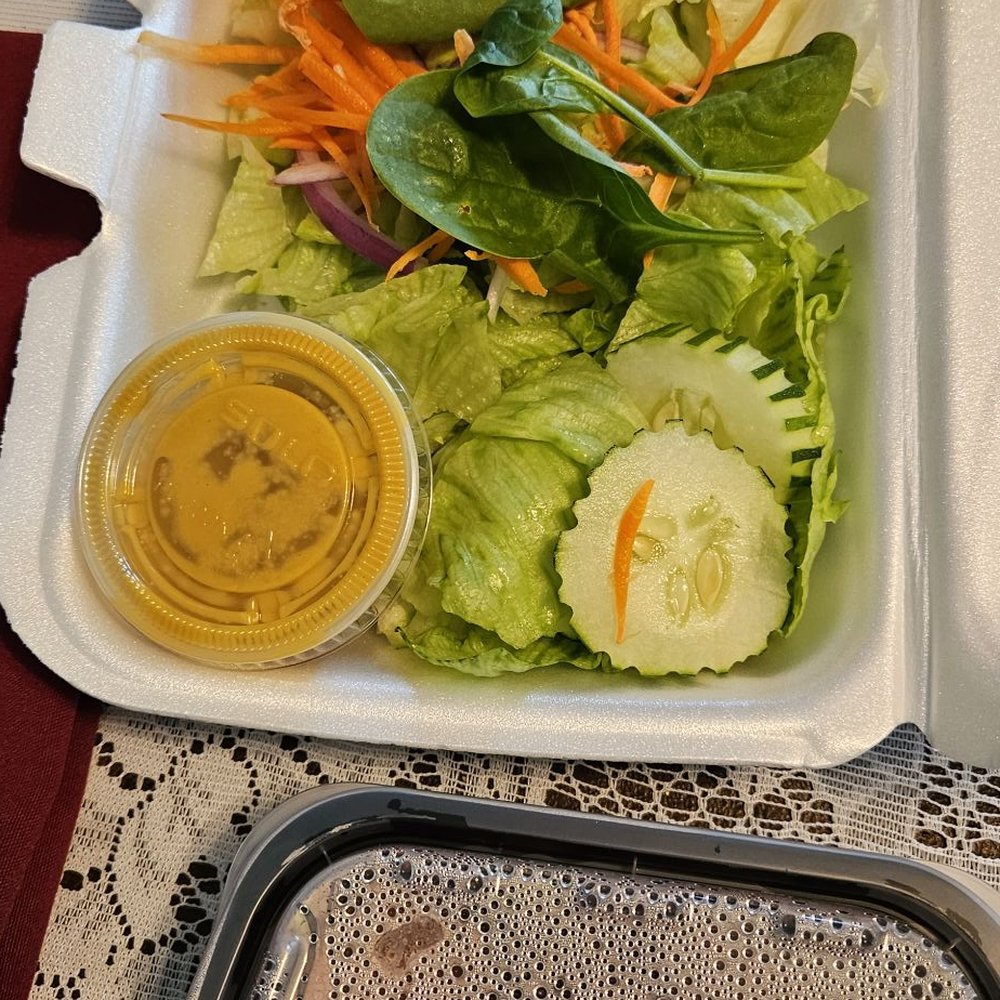 This is $18 worth of salad. It did come with a small container of watered-down sugar ginger dressing? This is $18 worth of salad. It did come with a small container of watered-down sugar ginger dressing?