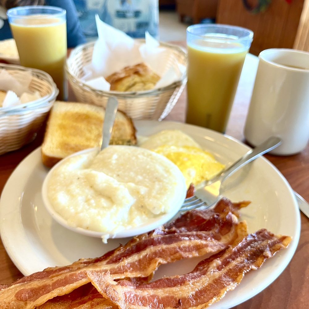 Gulf Stream Restaurant - Two egg breakfast, bacon and toast with a side of grits and homemade buscuit - Breakfast & Brunch Near Me - Carolina Beach, North Carolina Gulf Stream Restaurant - Two egg breakfast, bacon and toast with a side of grits and homemade buscuit - Breakfast & Brunch Near Me - Carolina Beach, North Carolina