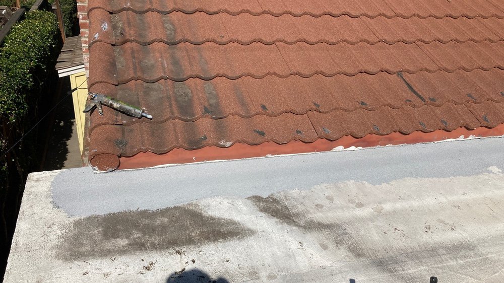 Slide of Eastman Roofing & Waterproofing