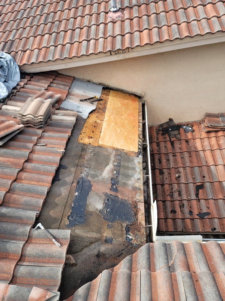 Slide of Nacs Roofing