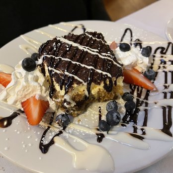 Corvo Bar and Grill - a piece of cake on a plate - Bars Near Me - Moodus, Connecticut