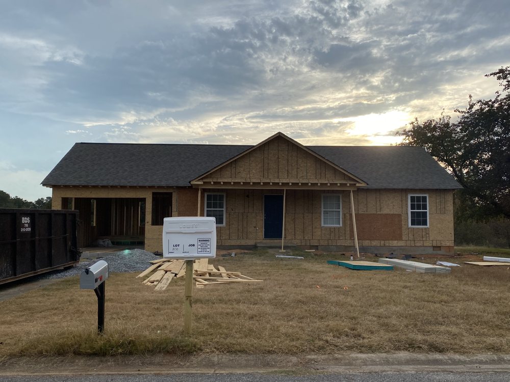 Slide of Rico’s Roofing Restorations