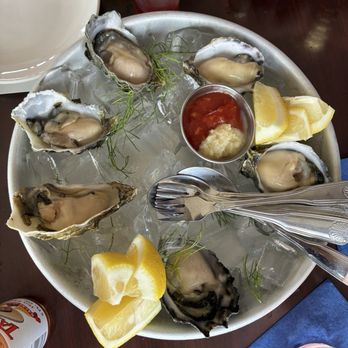 The Dutchie - the oysters with sauces and utensils - Seafood Near Me - Morro Bay, California The Dutchie - the oysters with sauces and utensils - Seafood Near Me - Morro Bay, California