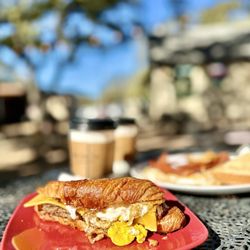 The Cracked Mug Coffee House - Sausage, Egg, & Cheese Croissant Sandwich