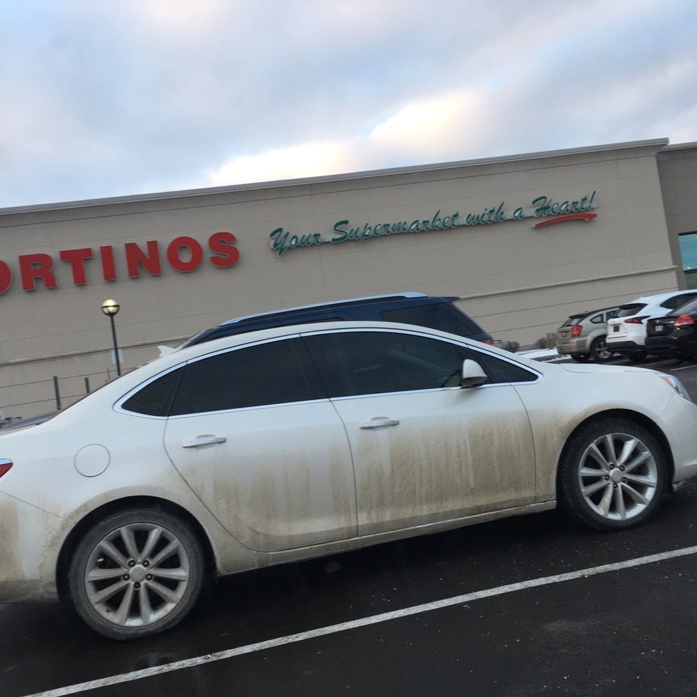 Fortinos - a white car parked in front of a store - Grocery Near Me - Brampton, Ontario Fortinos - a white car parked in front of a store - Grocery Near Me - Brampton, Ontario