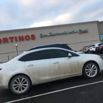Fortinos - a white car parked in front of a store - Grocery Near Me - Brampton, Ontario