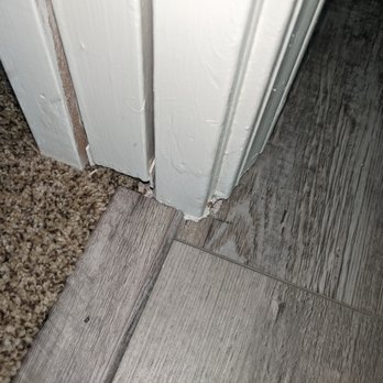 Oracle Abatement - Bathroom tile not installed correctly. Caulked in instead of interlock - Environmental Abatement Near Me - North Highlands, California