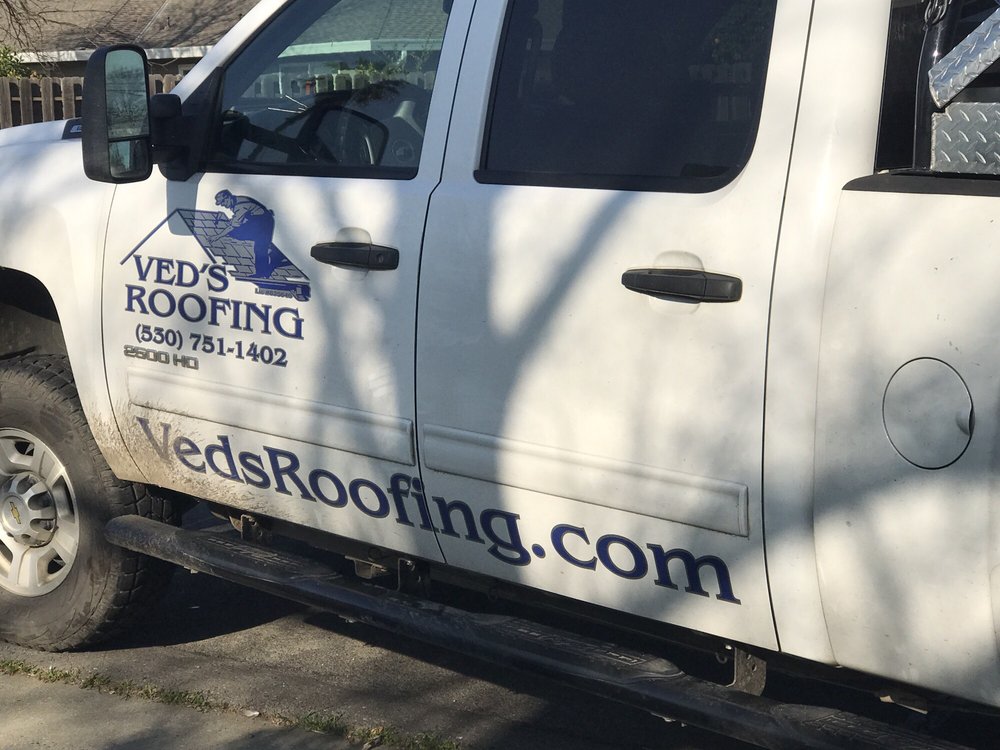 Slide of Ved's Roofing