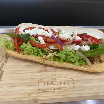 Hewitt's Meats - a sub sandwich on a cutting board - Meat Shops Near Me - Marshfield, Wisconsin