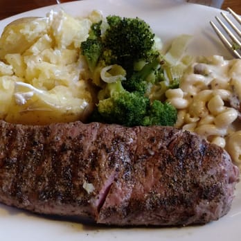 Bare Bones Steakhouse - 16oz strip,  baked potato, veggie of the day (broccoli with caramelized celery and onions). Scoop of bacon mac & cheese, too. - Steakhouses Near Me - Buford, Georgia