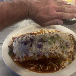 Burrito Grande (Texano) Steak, chicken, shrimp, rice, beans, peppers, onions, and some kind of AMAZING red sauce!