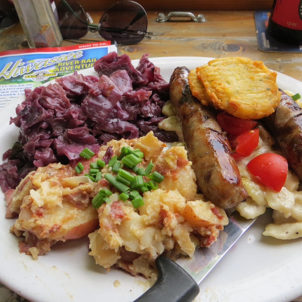 Brewhaus - Spaetzle with brats and a side of potato salad and red cabbage (plus one potato cake) - German Near Me - Chattanooga, Tennessee Brewhaus - Spaetzle with brats and a side of potato salad and red cabbage (plus one potato cake) - German Near Me - Chattanooga, Tennessee