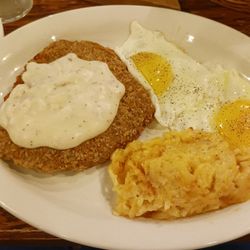 Chicken fried steak,2 sunny side eggs and hashbrown casserole