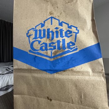 White Castle - a brown paper bag with a blue logo - Burgers Near Me - Greendale, Indiana