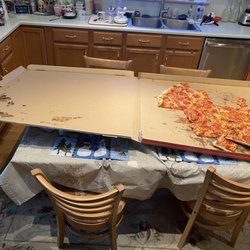 Firehouse Pizzeria - Large pizza was smashed just going through restaurant door