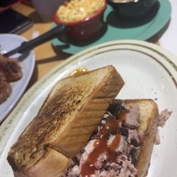 Deluxe Pig Out Sandwich with a side of Mac and Potato Salad