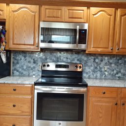 a kitchen with stainless steel appliances a kitchen with stainless steel appliances