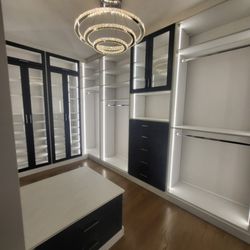 Chicagoland Custom Closets - Beautiful two tone walk in closet with integrated lighting.