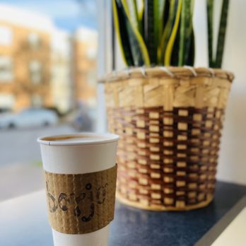 Borjo Coffeehouse - a cup of coffee on a table - Coffee & Tea Near Me - Norfolk, Virginia Borjo Coffeehouse - a cup of coffee on a table - Coffee & Tea Near Me - Norfolk, Virginia