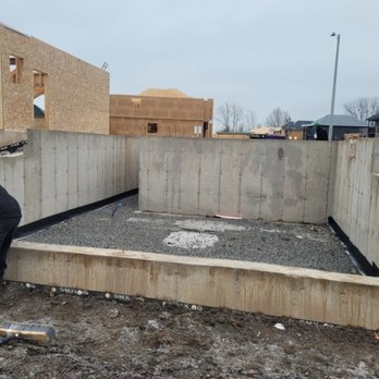 Integra GC - a man working on a foundation - General Contractors Near Me Integra GC - a man working on a foundation - General Contractors Near Me