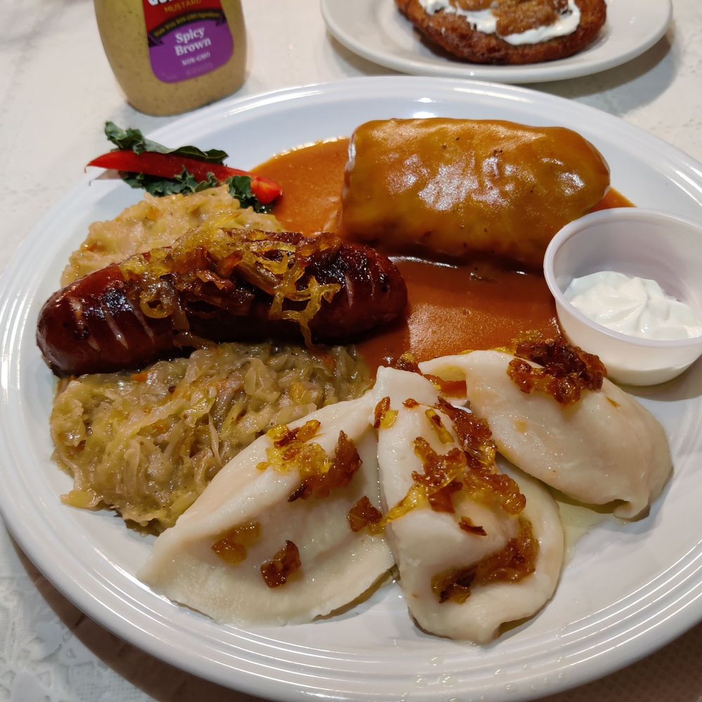 Anna's Polish Restaurant - Polish platter with cheese and potato perogies, kielbasa and sauerkraut, and stuffed cabbage Peep the potato pancakes in the back! - Polish Near Me - Winter Park, Florida Anna's Polish Restaurant - Polish platter with cheese and potato perogies, kielbasa and sauerkraut, and stuffed cabbage Peep the potato pancakes in the back! - Polish Near Me - Winter Park, Florida