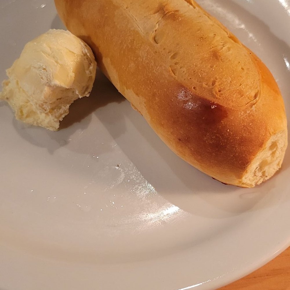 Black Oak Grill - Dinner roll and Butter - American Near Me - Branson, Missouri Black Oak Grill - Dinner roll and Butter - American Near Me - Branson, Missouri