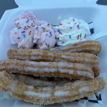 Churros Don Lencho - a close up of a churros with ice cream and sprinkles - Street Vendors Near Me - Phoenix, Arizona
