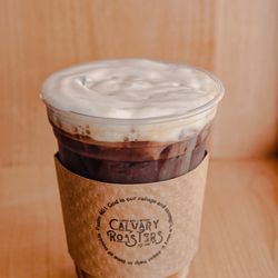 Calvary Roasters - White Dove, Macchiato with Cold Foam. Carmel, White Chocolate, with Carmel Drizzle
