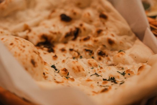 Photo of Taste of India - Seattle, WA, US. Garlic Naan