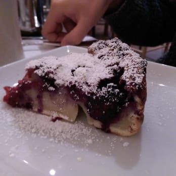 Clafoutis - Mixed berries clafoutis (heated in the oven before serving...mmmm) - French Near Me - Santa Fe, New Mexico Clafoutis - Mixed berries clafoutis (heated in the oven before serving...mmmm) - French Near Me - Santa Fe, New Mexico