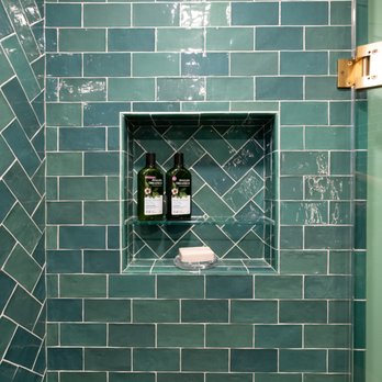 Creative Kitchens & Baths Seattle - a green tiled shower - General Contractors Near Me