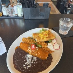 Happy hour chicken enchilada + chicken flauta Happy hour chicken enchilada + chicken flauta