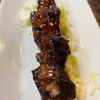 Caribbean Haven - Filipino Pork BBQ skewer. They let me order one by itself! That's so awesome! So accommodating! Delicious! - Caribbean Near Me - Ventura, California