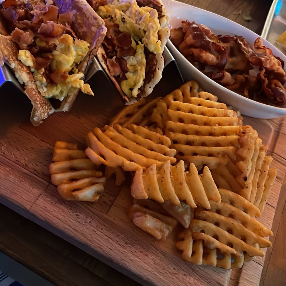 Pancake Taco w/ a side of waffle fries and side of bacon Pancake Taco w/ a side of waffle fries and side of bacon