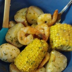Swampland Seafood , Chicken & More - Yes, that is a spatula to get all the sauce up