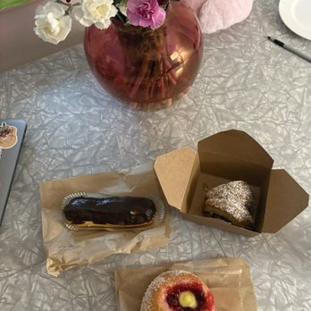 Rosellini's - Eclair, coffee cake, plum & cream filled brioche - Bakeries Near Me - Seattle, Washington