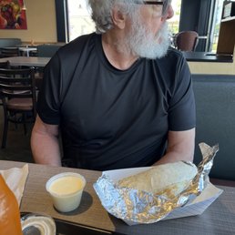Burrito, quesadilla, chips and queso