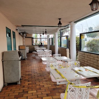 El Taco - a patio with tables and chairs - Mexican Near Me - Downey, California
