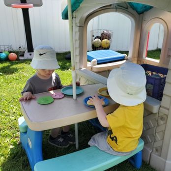 Wee Care Day Care - Playing eating on the patio in the fenced yard. - Child Care & Day Care Near Me - Bridgeport, Connecticut Wee Care Day Care - Playing eating on the patio in the fenced yard. - Child Care & Day Care Near Me - Bridgeport, Connecticut
