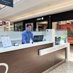 Currency Exchange International - Dillon at the counter