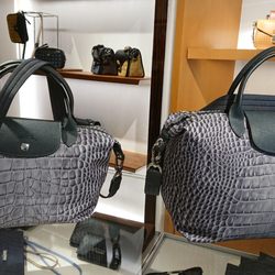 Longchamp - Not much difference in price, so get the bigger size?