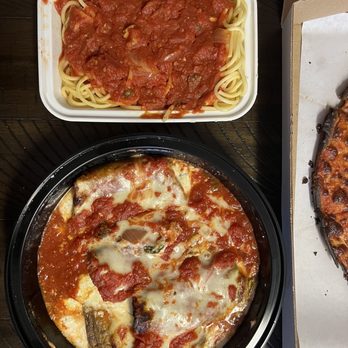 Reservoir Restaurant - Takeout Eggplant Rollatini Dinner with pasta side, next to pizza box for scale. - Italian Near Me - South Orange, New Jersey Reservoir Restaurant - Takeout Eggplant Rollatini Dinner with pasta side, next to pizza box for scale. - Italian Near Me - South Orange, New Jersey