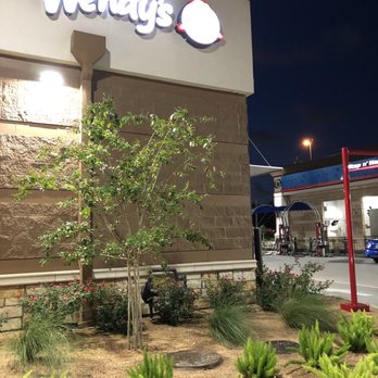 Wendy's - the front of a wendy's restaurant at night - Fast Food Near Me - Houston, Texas