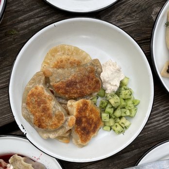 Apteka - Fried pierogies, with smoked carrots and sauerkraut in some, and lentils and zucchini in others. - Vegan Near Me - Pittsburgh, Pennsylvania