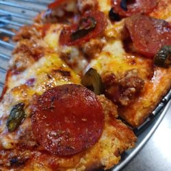 Aurelio's Pizza - Munster - Thin crust pepperoni, sausage with black olives and a few jalapeños ( cause we are from Texas).