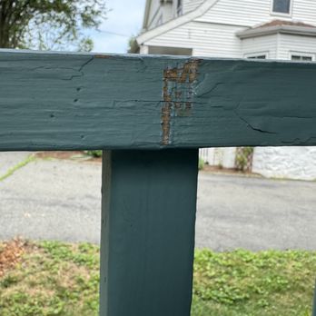 Black Anchor Handyman And Millwork - This is where the storm door hits the railing because there's no chain or other mechanism to prevent the wind from blowing it - Handyman Near Me Black Anchor Handyman And Millwork - This is where the storm door hits the railing because there's no chain or other mechanism to prevent the wind from blowing it - Handyman Near Me