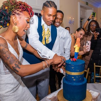 Codetta Bake Shop - Cake cutting (cake topper not made by Codetta) - Bakeries Near Me - Baltimore, Maryland