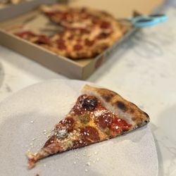 Pizza Rosalie - Slice of sausage pizza with added pepperoni!!!  DELICIOUS!