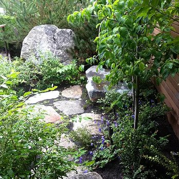 Living Systems Landscaping - a stone path in a garden - Landscaping Near Me Living Systems Landscaping - a stone path in a garden - Landscaping Near Me
